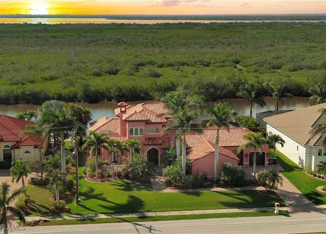 Property at 3520 Surfside Blvd, Cape Coral, FL 33914, 4 beds, 5 baths