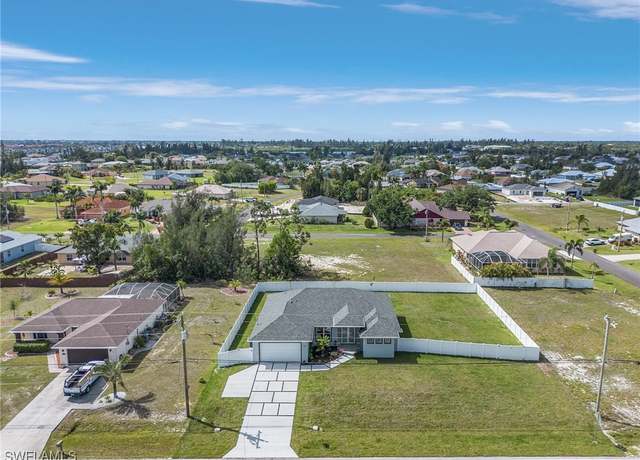 Property at 1724 Embers Pkwy W, Cape Coral, FL 33993, 4 beds, 2.5 baths