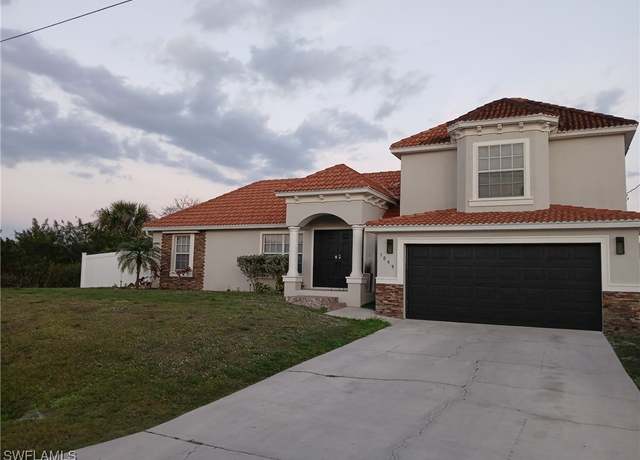 Property at 1099 Gunby Ave S, Lehigh Acres, FL 33974, 4 beds, 2 baths