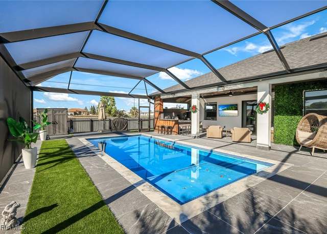 Property at 712 NE 2nd Pl, Cape Coral, FL 33909, 4 beds, 3 baths