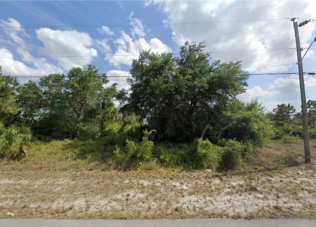 Property at 730 Manhattan St E, Lehigh Acres, FL 33974