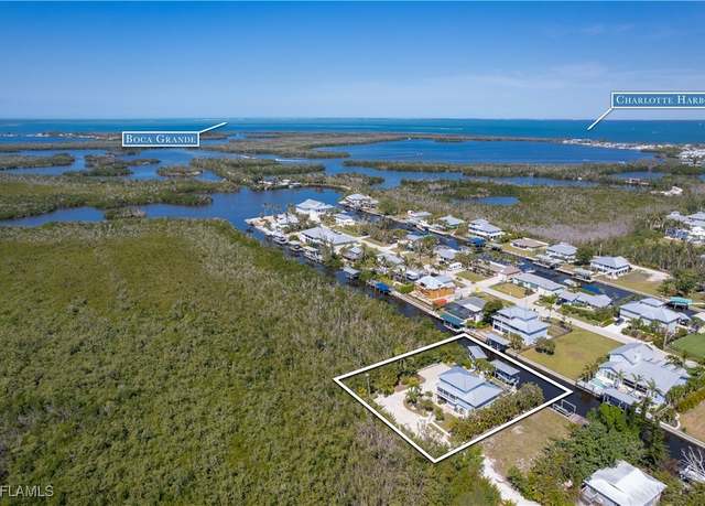 Property at 7940 Lobean Ln, Bokeelia, FL 33922, 4 beds, 3 baths