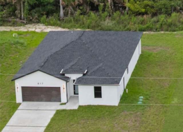 Property at 617 Greenbriar Blvd, Lehigh Acres, FL 33972, 3 beds, 2 baths