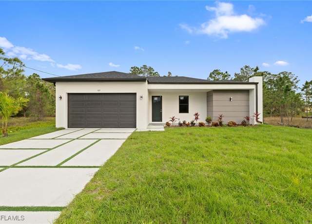 Property at 748 Cardinal St E, Lehigh Acres, FL 33974, 3 beds, 2.5 baths