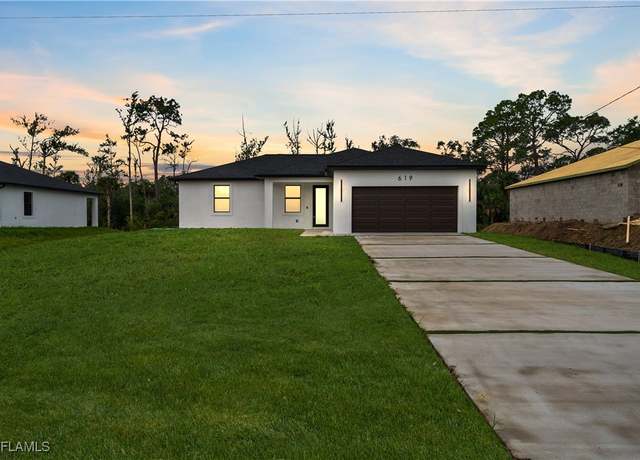 Property at 619 Greenbriar Blvd, Lehigh Acres, FL 33972, 3 beds, 2 baths