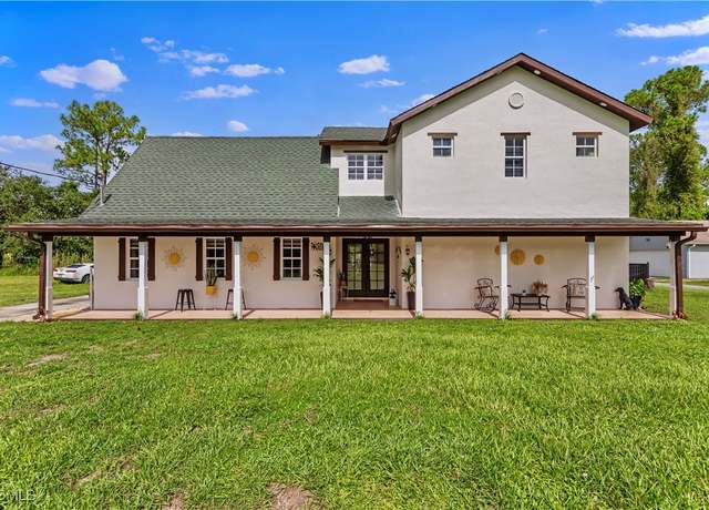 Property at 2011 Mill St, Lehigh Acres, FL 33972, 5 beds, 4.5 baths