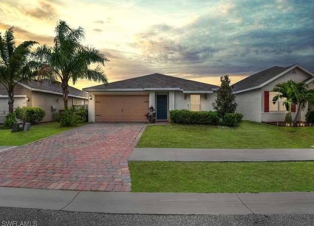 Property at 10545 Crossback Ln, Lehigh Acres, FL 33936, 4 beds, 2 baths