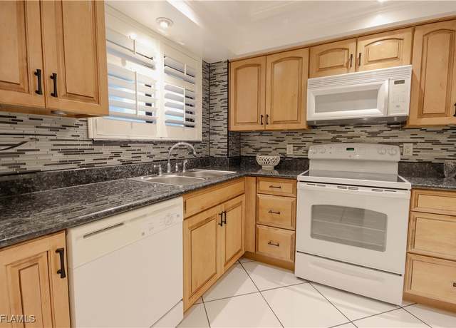 Property at 2121 Collier Ave #406, Fort Myers, FL 33901, 2 beds, 2 baths