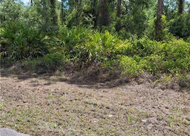 Property at 1702 8th Ave, Lehigh Acres, FL 33972