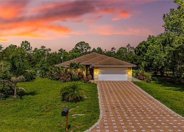 Property at 1407 Poinsettia Ave, Lehigh Acres, FL 33972, 4 beds, 2 baths