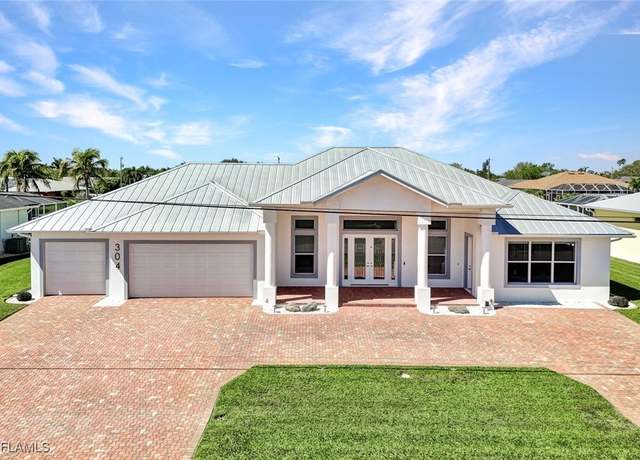 Property at 304 NE 14th Ave, Cape Coral, FL 33909, 3 beds, 3.5 baths
