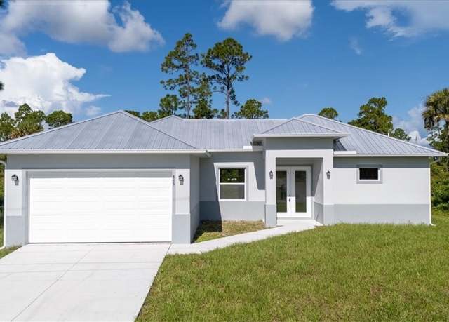Property at 816 Genoa Ave S, Lehigh Acres, FL 33974, 3 beds, 2.5 baths
