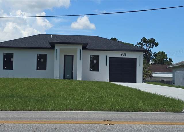 Property at 939 Sentinela Blvd, Lehigh Acres, FL 33974, 3 beds, 3 baths