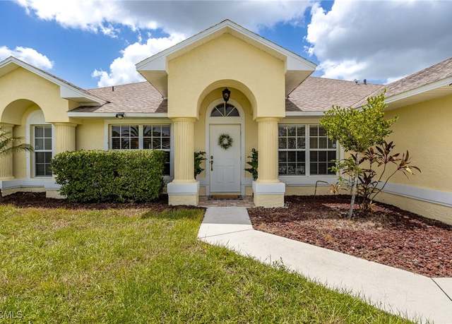 Property at 558 Charwood Ave S, Lehigh Acres, FL 33974, 4 beds, 2 baths