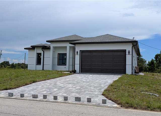 Property at 2607 E 15th St, Lehigh Acres, FL 33972, 4 beds, 2 baths