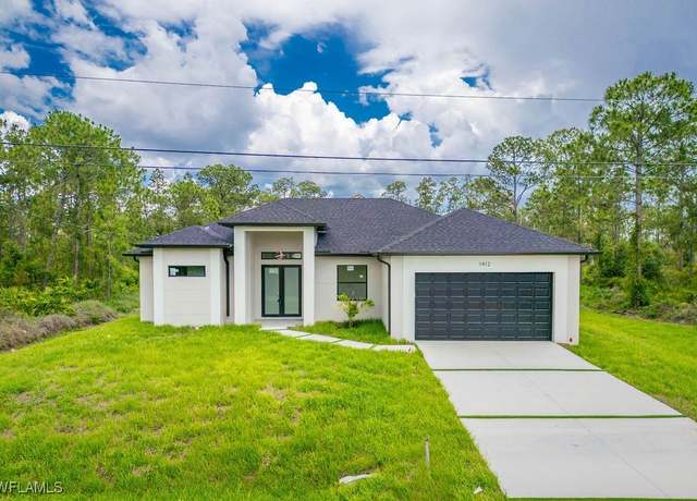 Property at 1412 5th Ave, Lehigh Acres, FL 33972, 4 beds, 2 baths