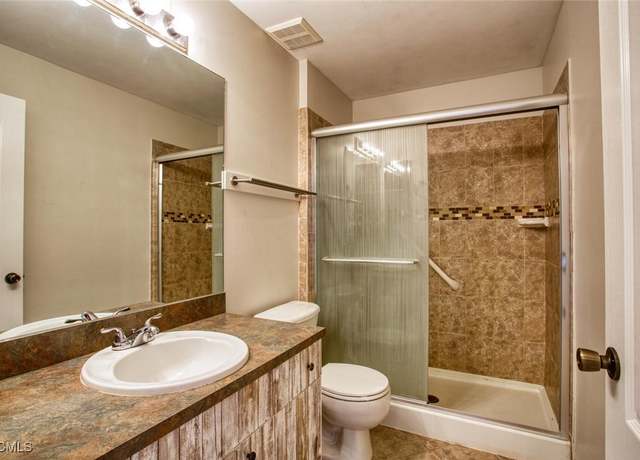 Property at 3405 33rd St SW, Lehigh Acres, FL 33976, 4 beds, 2 baths