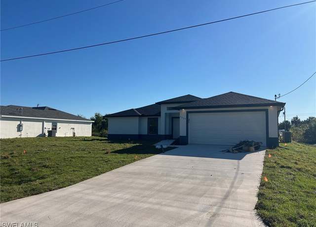 Property at 3003 Olive Ave S, Lehigh Acres, FL 33976, 4 beds, 2 baths