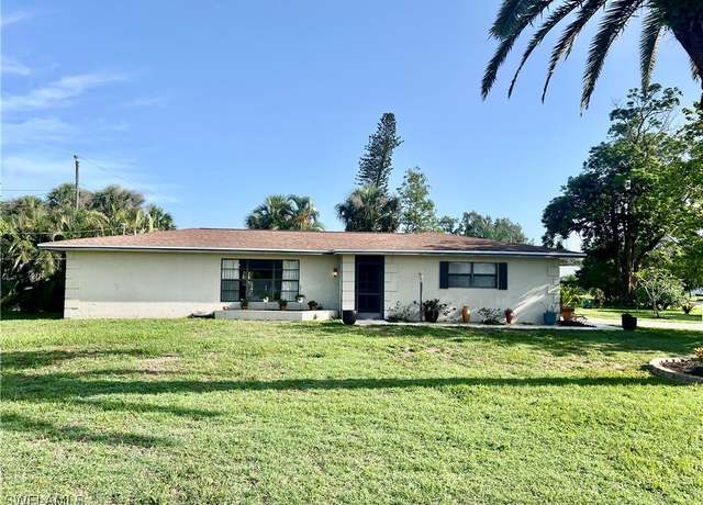Property at 1409 Scenic St, Lehigh Acres, FL 33936, 3 beds, 2 baths
