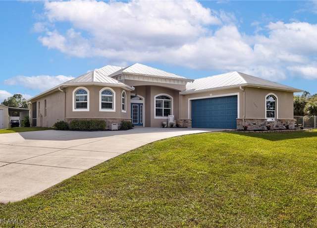 Property at 7825 2nd Ter, Lehigh Acres, FL 33936, 3 beds, 3 baths