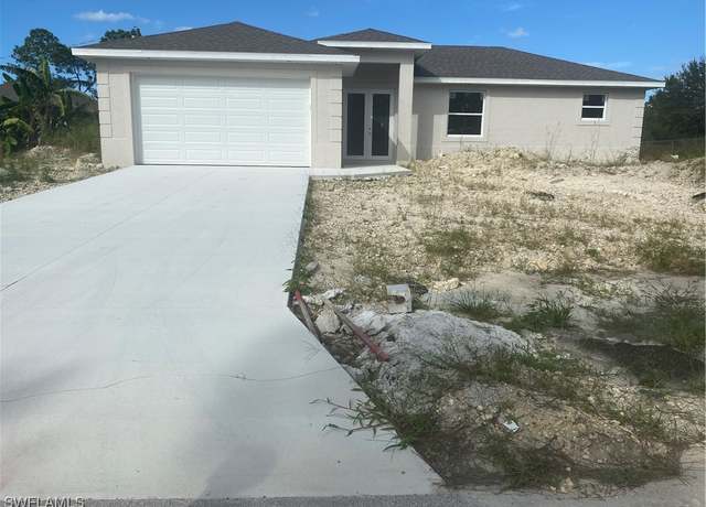 Property at 3703 E 8th St, Lehigh Acres, FL 33972, 3 beds, 2 baths