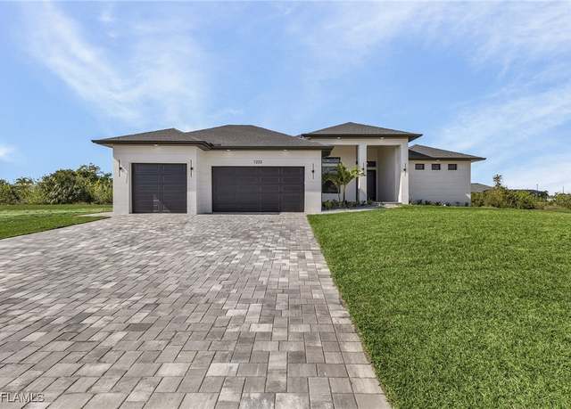 Property at 1222 NE 6th Ave, Cape Coral, FL 33909, 3 beds, 3.5 baths