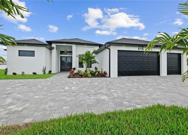 Property at 615 Tropicana Pkwy W, Cape Coral, FL 33993, 4 beds, 3 baths