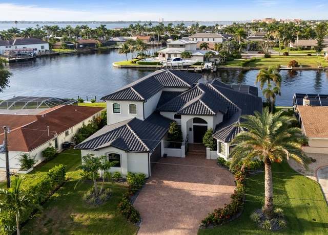 Property at 1950 SE 36th St, Cape Coral, FL 33904, 4 beds, 5 baths