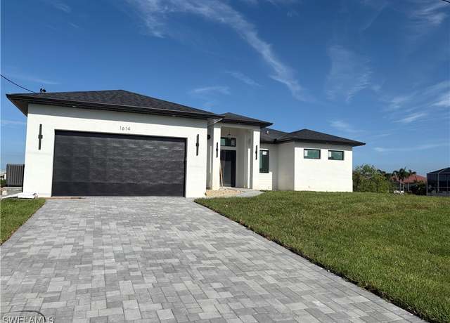 Property at 1614 NE 1st Pl, Cape Coral, FL 33909, 4 beds, 3 baths