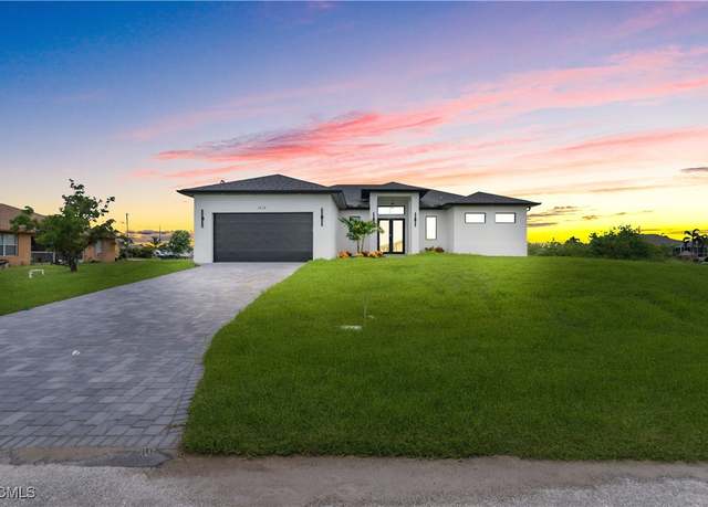 Property at 1614 NE 1st Pl, Cape Coral, FL 33909, 4 beds, 3 baths