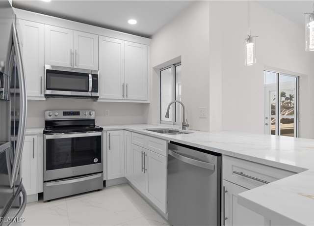 Property at 1204 El Dorado Pkwy W #102, Cape Coral, FL 33914, 3 beds, 2 baths