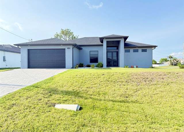 Property at 1719 NW 15th St, Cape Coral, FL 33993, 4 beds, 3 baths