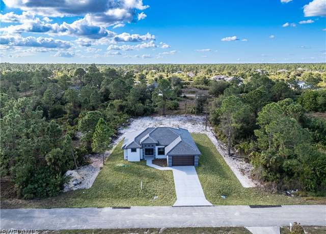 Property at 1205 Hibiscus Ave, Lehigh Acres, FL 33972, 4 beds, 3 baths
