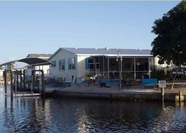 Property at 3140 Binnacle Ln, St. James City, FL 33956, 3 beds, 2 baths