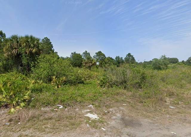 Property at 519 Trinity St E, Lehigh Acres, FL 33974
