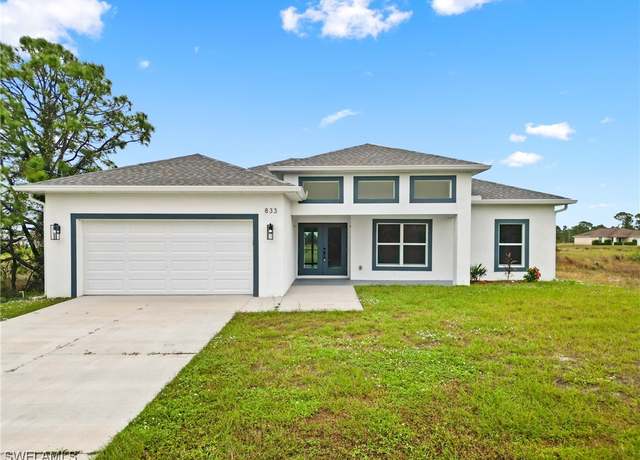 Property at 833 Newell St E, Lehigh Acres, FL 33974, 3 beds, 2 baths