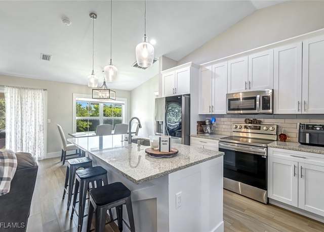 Property at 2806 22nd St W, Lehigh Acres, FL 33971, 3 beds, 2 baths