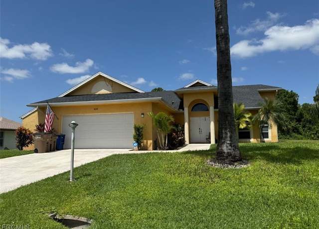 Property at 403 Poinsettia Ave, Lehigh Acres, FL 33972, 3 beds, 2.5 baths
