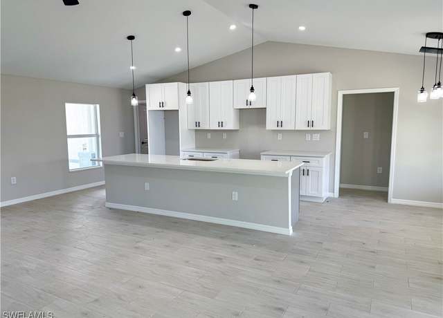 Property at 1806 NE 27th St, Cape Coral, FL 33909, 4 beds, 3 baths