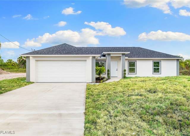 Property at 955 Plantation Rd, Lehigh Acres, FL 33974, 4 beds, 2 baths