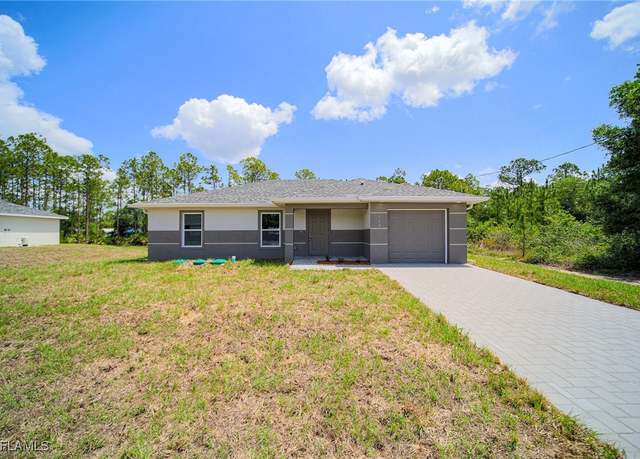 Property at 128 Sanborn Dr, Lehigh Acres, FL 33972, 3 beds, 2 baths
