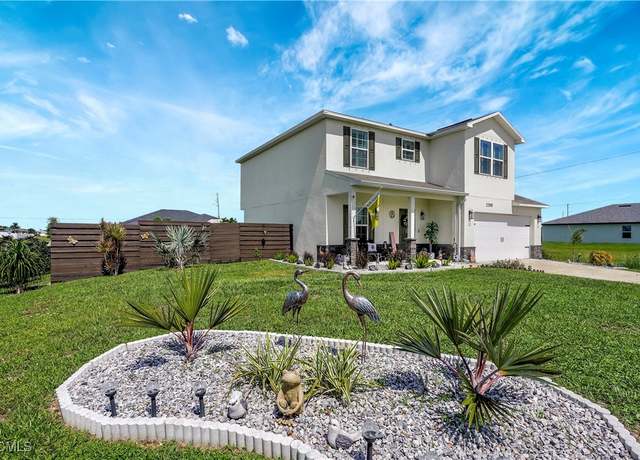 Property at 2200 NE Juanita Pl, Cape Coral, FL 33909, 3 beds, 2.5 baths