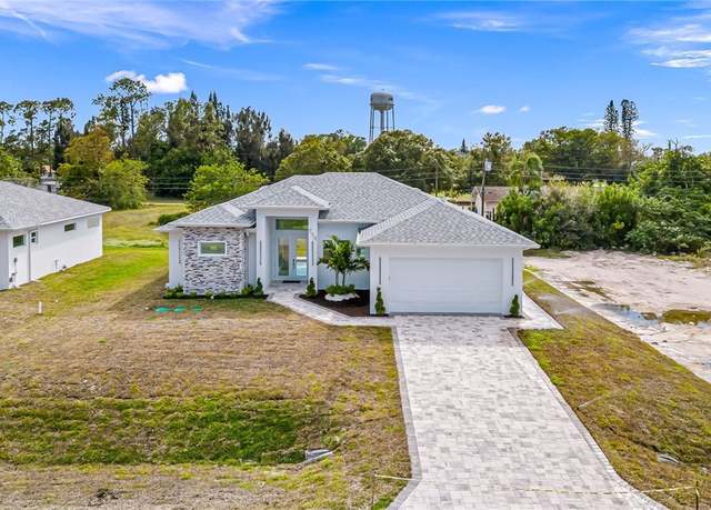 Property at 712 Manhattan St E, Lehigh Acres, FL 33974, 3 beds, 2 baths