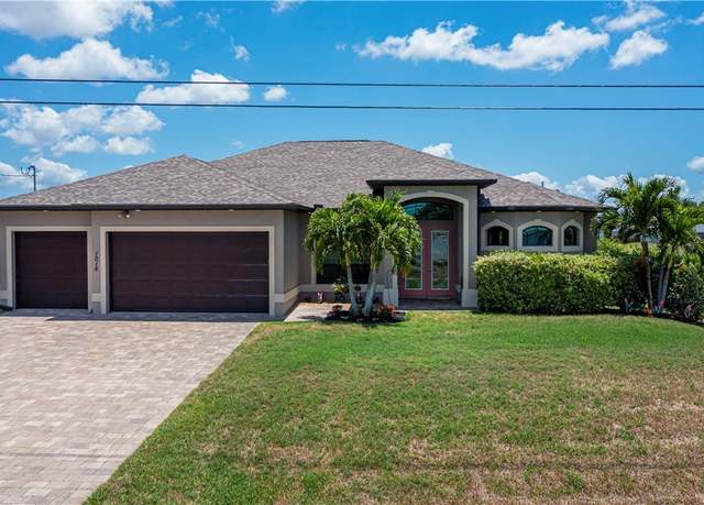 Property at 1018 NW 13th Ter, Cape Coral, FL 33993, 3 beds, 2.5 baths