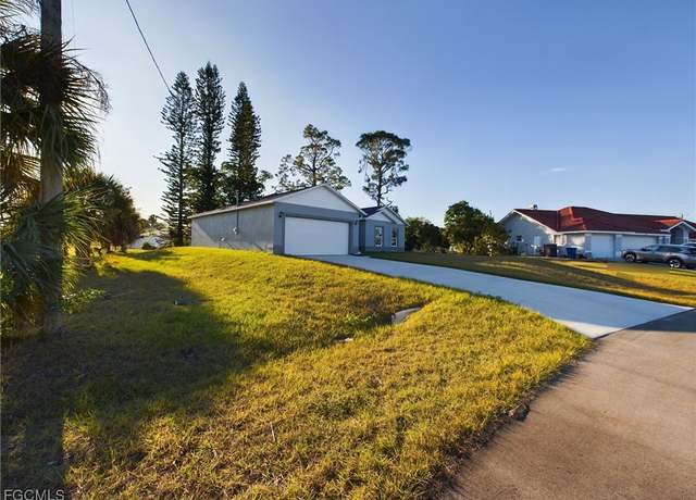 Property at 15 Hampton Ave, Lehigh Acres, FL 33936, 3 beds, 2.5 baths