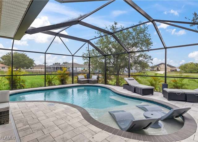 Property at 927 NW 12th Ter, Cape Coral, FL 33993, 4 beds, 2 baths