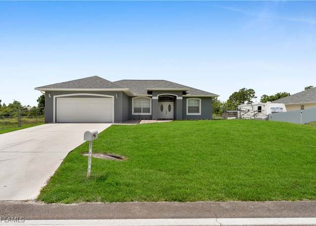 Property at 902 E 10th St, Lehigh Acres, FL 33972, 3 beds, 2 baths