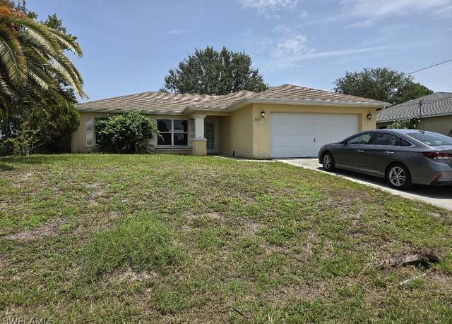 Property at 3022 34th St SW, Lehigh Acres, FL 33976, 3 beds, 2 baths