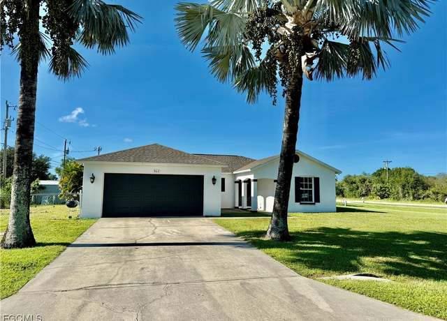 Property at 802 Kingsbury Ct, Lehigh Acres, FL 33974, 4 beds, 2 baths