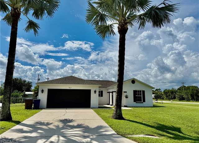 Property at 802 Kingsbury Ct, Lehigh Acres, FL 33974, 4 beds, 2 baths